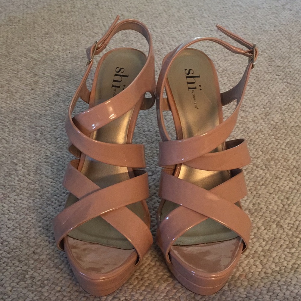 Shi by journeys heels.